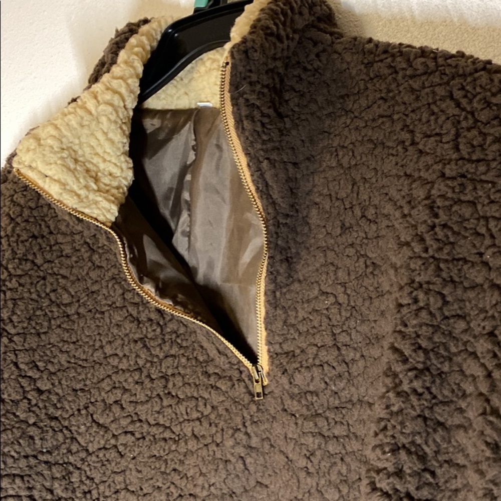 Brown teddy bear jacket zipped up crewneck